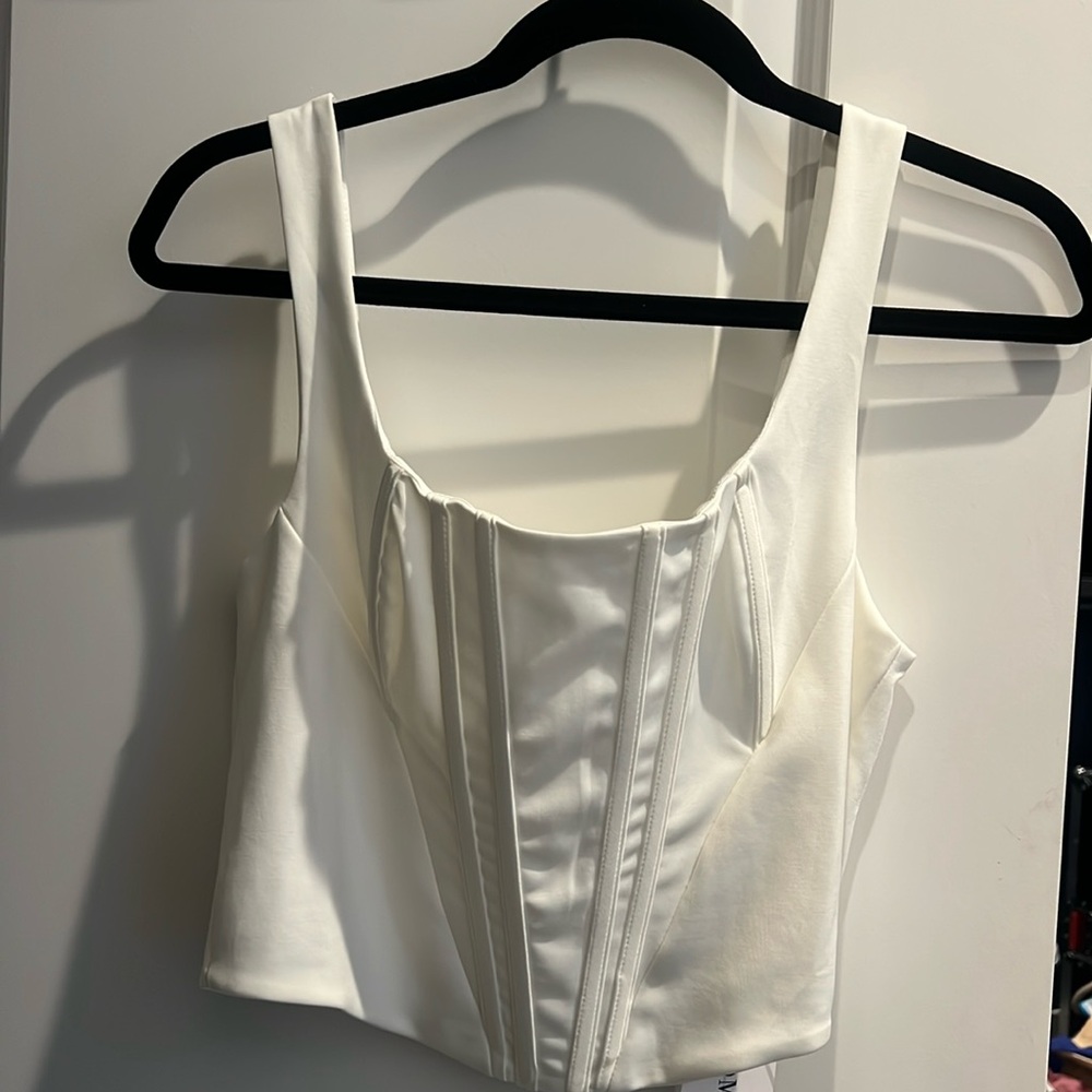 Brand new white scoop neck corset crop top with gold zip closure